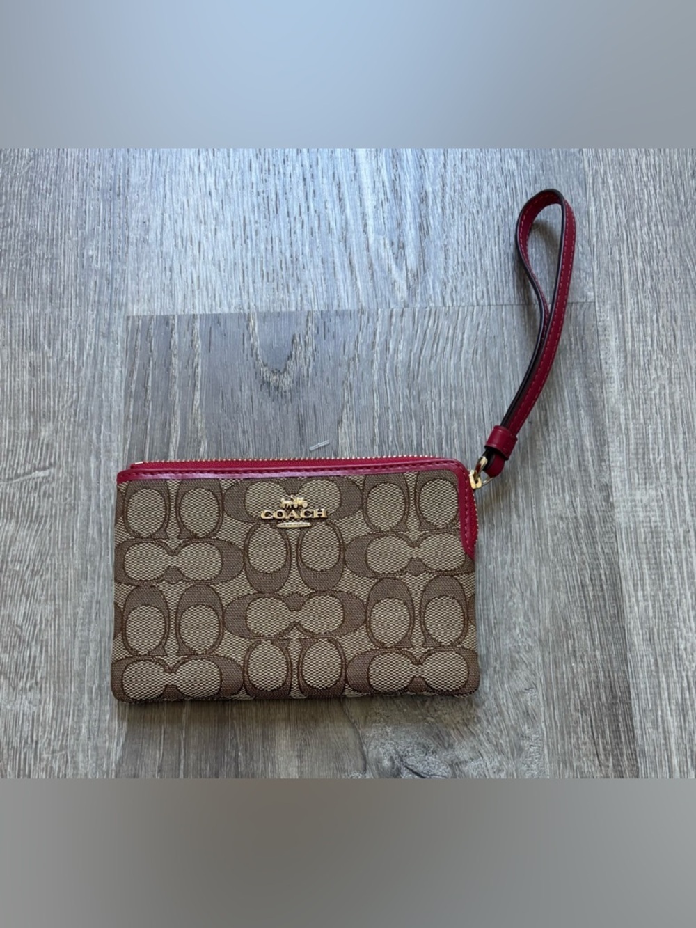 NWOT Coach Brown Signature Canvas Wristlet with Red Trim